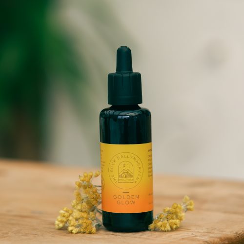 an image of the front of a bottle of golden glow face oil