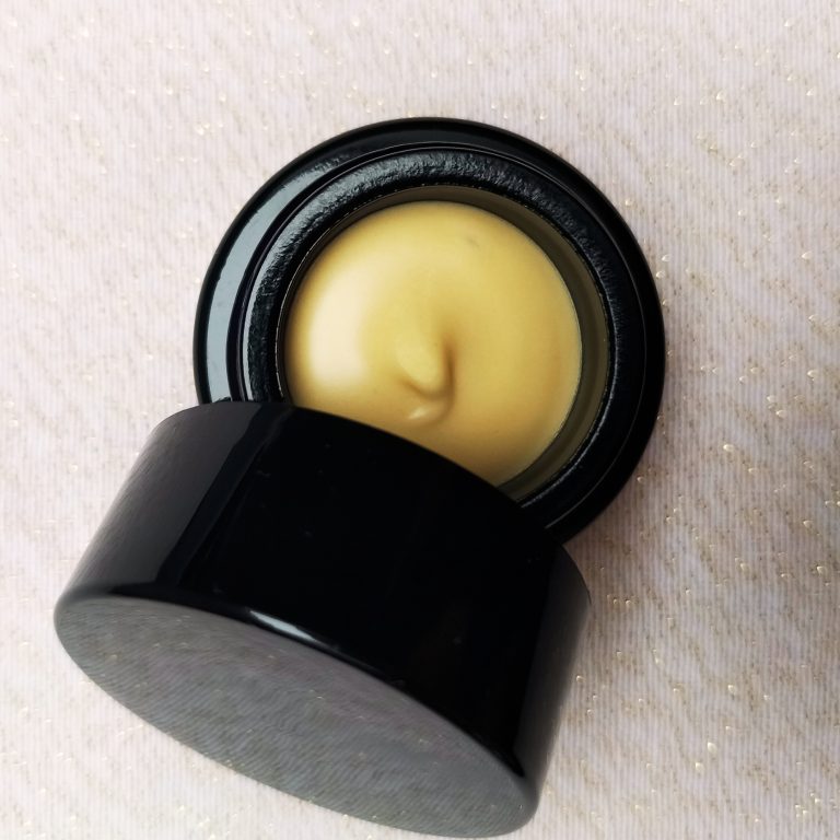 top-down image of an open container of lip luscious butter